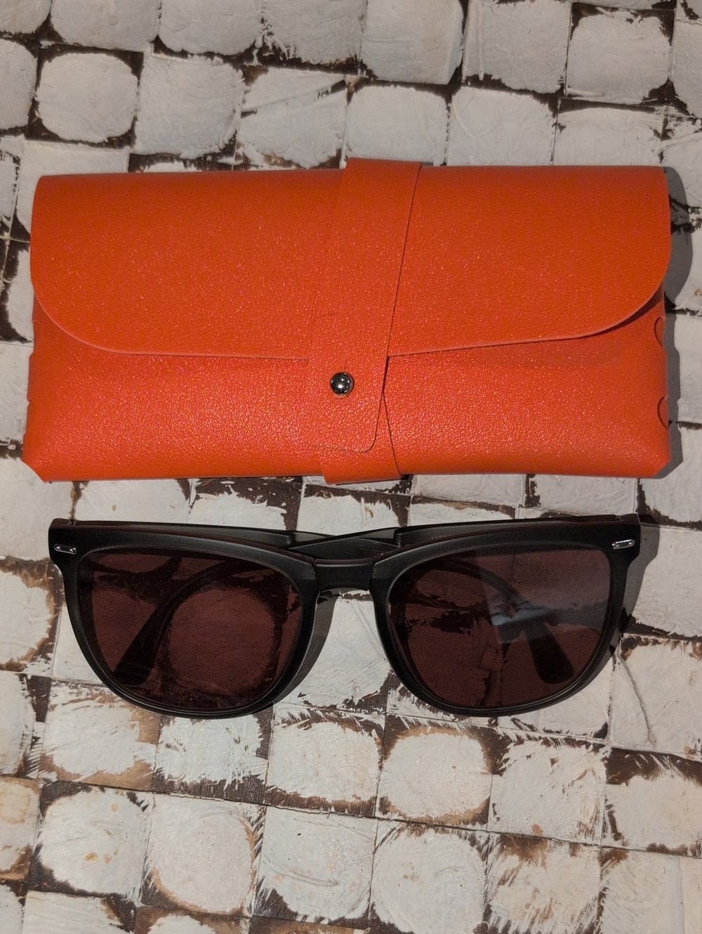 UpThree Sunglasses And An Orange Sunglass Case